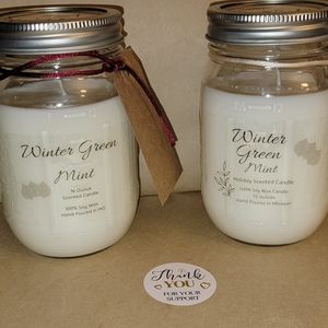 Two large 16oz Wintergreen Mint Holiday Scented Candles